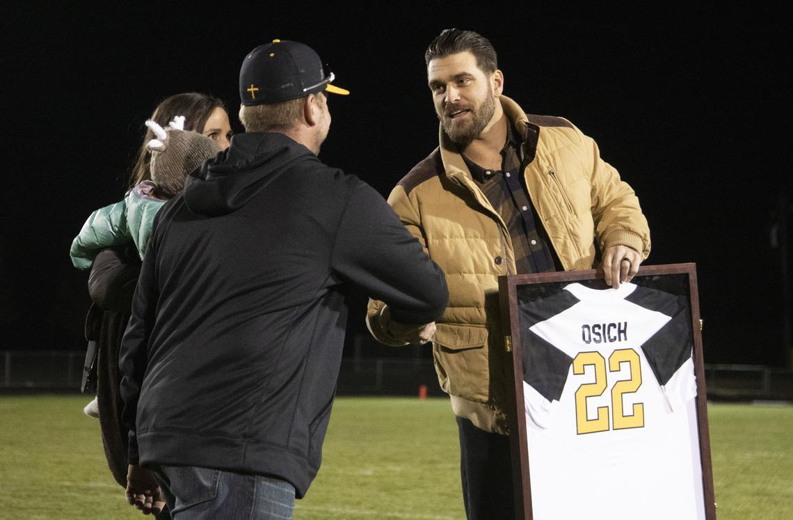 Bishop Kelly retired the baseball jersey of 2007 graduate Josh Osich at halftime. He has pitched in the Majors for five seasons, including this year with the Chicago White Sox.