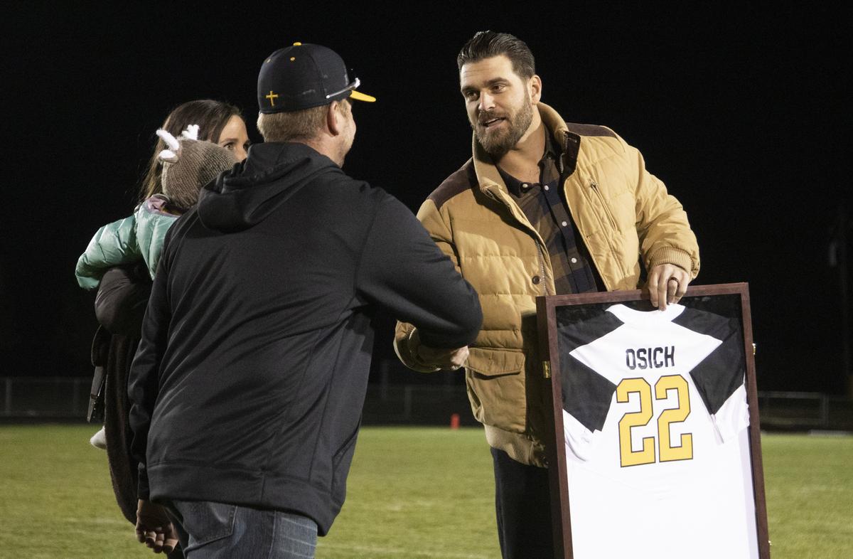 Bishop Kelly grad Josh Osich had his baseball jersey retired during a Knights’ football game last fall.