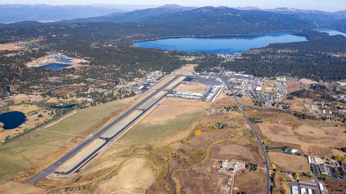 A view of the McCall Airport looking north toward Payette Lake shows open land south of the airport. Unreviewed parcel splits have led to plans for housing developments south of the airport, which officials worry could impact flights and prove unsafe.