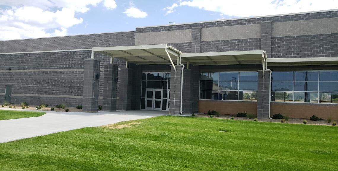 A new cafeteria and gymnasium at Hillside Junior High has been completed. Last week, crews were installing grass turf behind the building and were working on a new football field.
