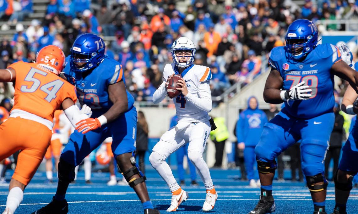 Boise State quarterback Hank Bachmeier waits for his next move during their spring game held on Saturday, April 9, 2022, at Albertsons Stadium. DEFENSE: 98 Herbert Gums nose tackle 95 Divine Obichere defensive tackle 99 Scott Matlock defensive tackle 0 JL Skinner safety 4 Sam Vidlak safety 15 Deven Wright defensive lineman 26 Caleb Biggers cornerback 33 Cortez Hogans OFFENSE: 19 Hank Bachmeier QB 24 George Holani RB 10 Taylen Green QB 2 Ashton Jeanty RB 5 Stef Cobbs WR 81 Austin Bolt WR