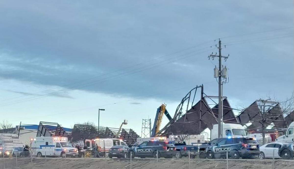 Police and emergency vehicles respond to the scene of a building collapse Wednesday near the Boise Airport.