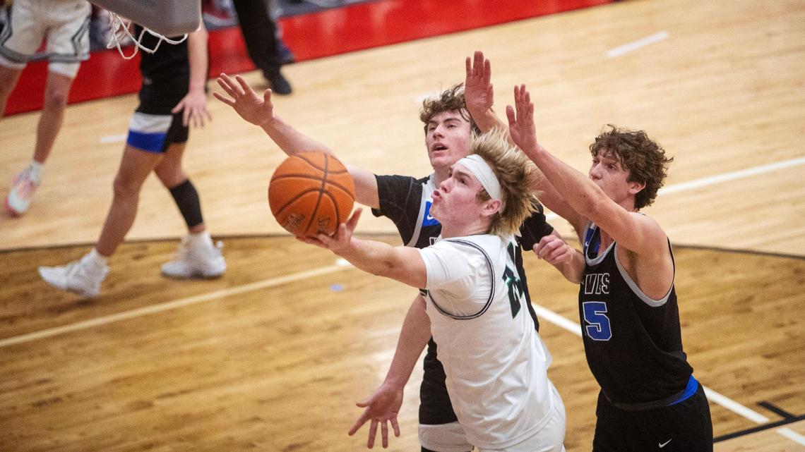 Mountain View senior Dawson Wahl finds a path to the hoop for two points in a the 5A District Three boys basketball tournament semifinals Tuesday at Owyhee. The Mavericks beat Timberline 65-43 to clinch themselves a spot at state and in Thursday’s district championship.