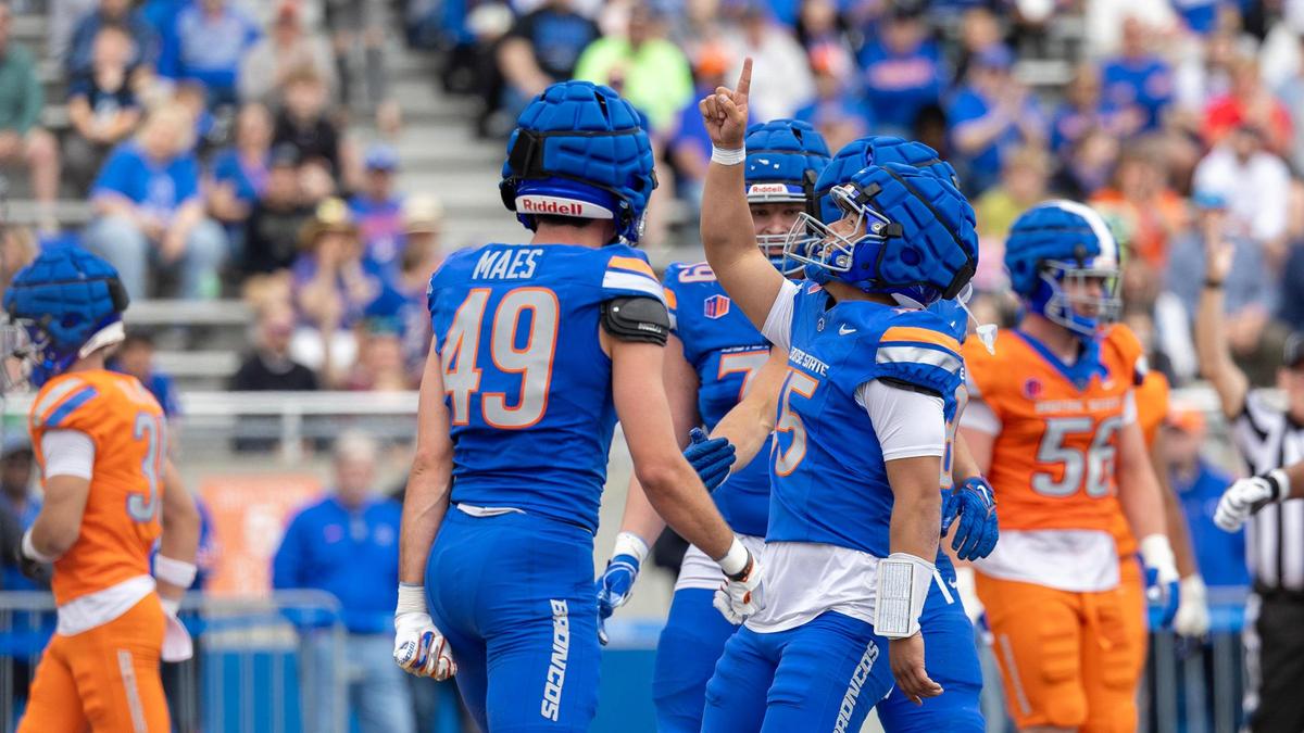 Boise State quarterback Zeke Martinez points up after scoring a touchdown during the spring football game at Albertsons Stadium, Saturday, April 19, 2025.