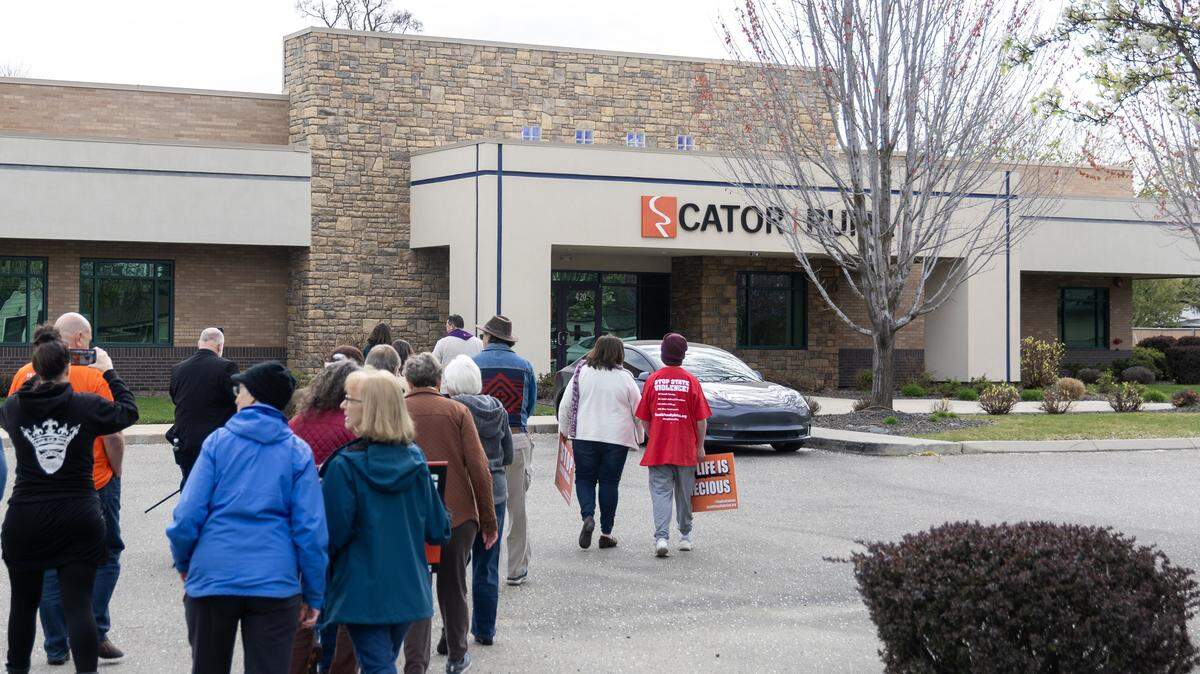 People against the death penalty gather outside of Cator Ruma and Associates, Tuesday, March 31, 2026. Cator Ruma and Associates is a Boise engineering firm contracted to design Idaho's new firing squad execution chamber.
