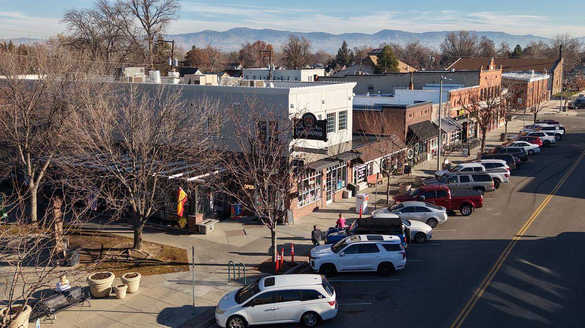 Cars line the street in Old Town Meridian. As the city has grown, parking has become more of a concern for downtown business owners.