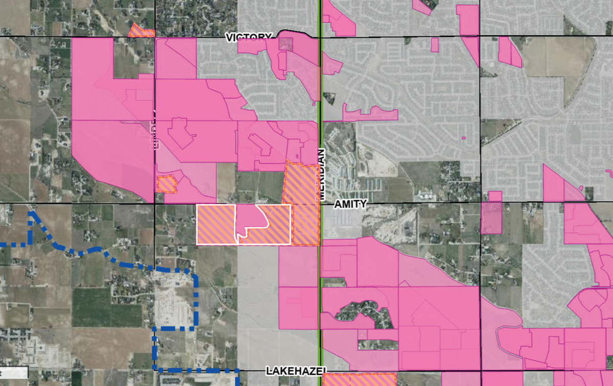 A city planning map shows how the area surrounding Meridian and Amity roads in South Meridian is growing. Areas shaded in diagonal orange and pink stripes show active development applications, while the area in pink shows all applications from 2018 through 2026. The area outlined in white is the site of the proposed Storyrock development.