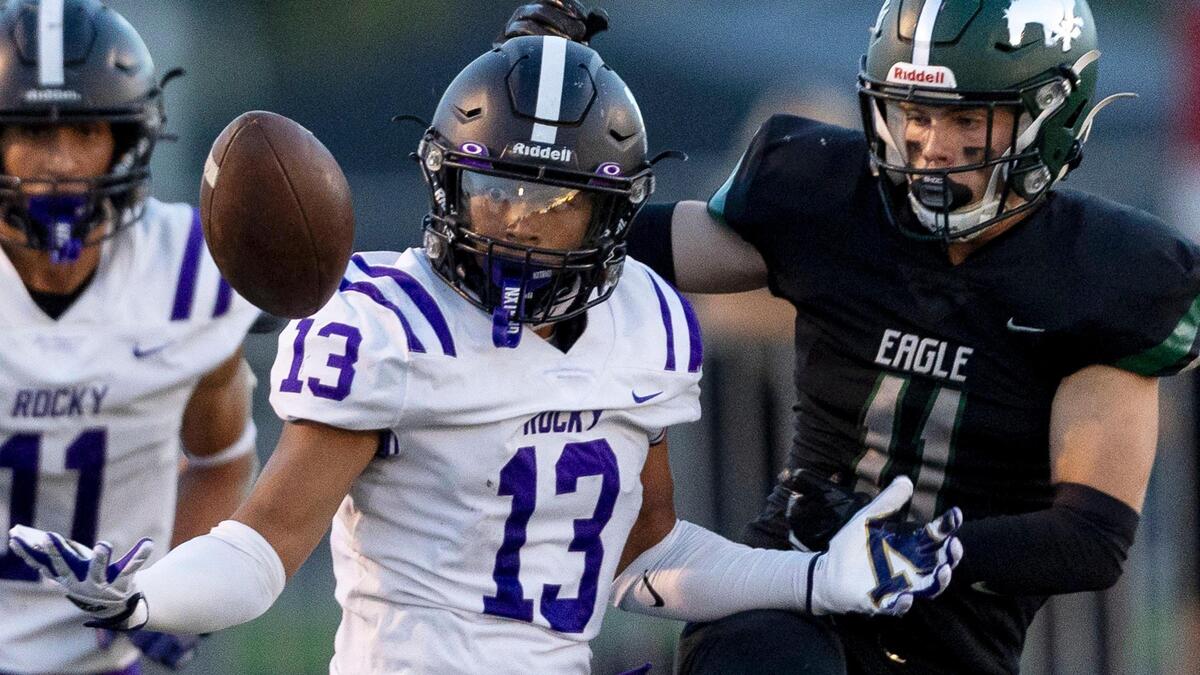 Rocky Mountain corner Kaiden Kimble-Turner tips and intercepts a pass intended for Eagle’s Gavin Crawford last season. He’s one of 15 returning starters for the Grizzlies, and starts the year with offers from Wyoming, Idaho, Idaho State and Eastern Washington.
