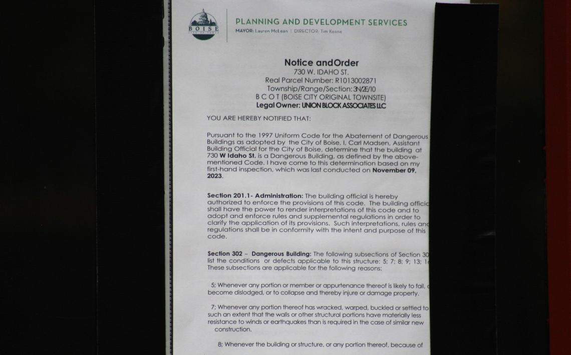 A notice posted on the doors of the building said it is “dangerous.”