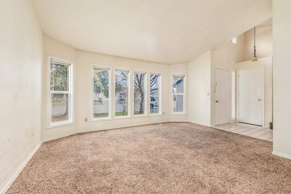 The Poppy Street home has a large front room with windows facing the street.