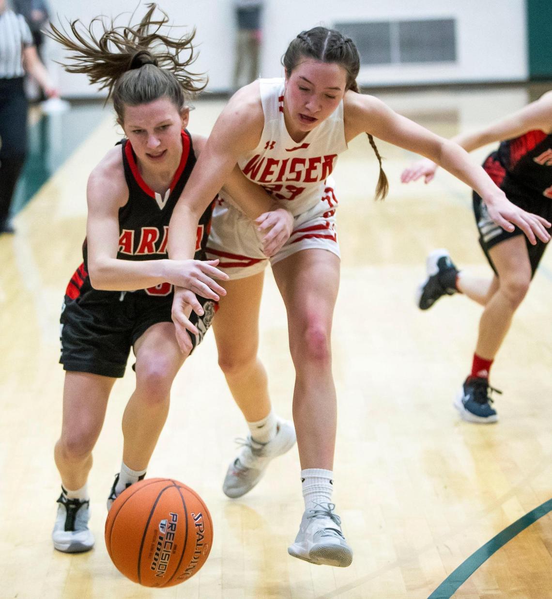 Weiser junior Mattie Shirts, left, returns after averaging 12.2 points and 9.1 rebounds a year ago.