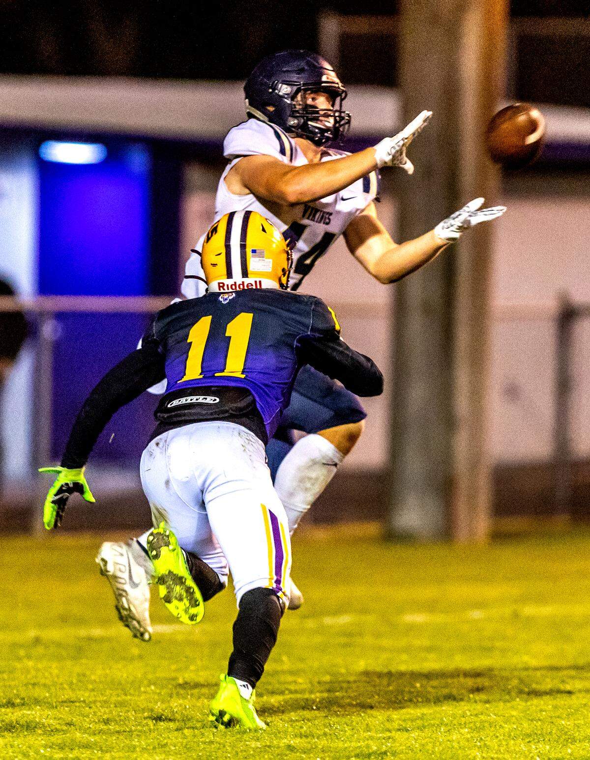 Middleton senior Cole Holman makes a catch under pressure during a 5A state playoff game in Lewiston last fall. He’s one of several projected two-way starters for the Vikings.