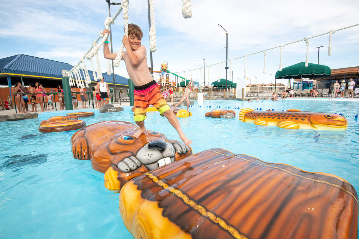 One of the three new attractions is an adventure pool with floating beaver, log and fish-shaped floats that guests can traverse using an overhead ropes course.