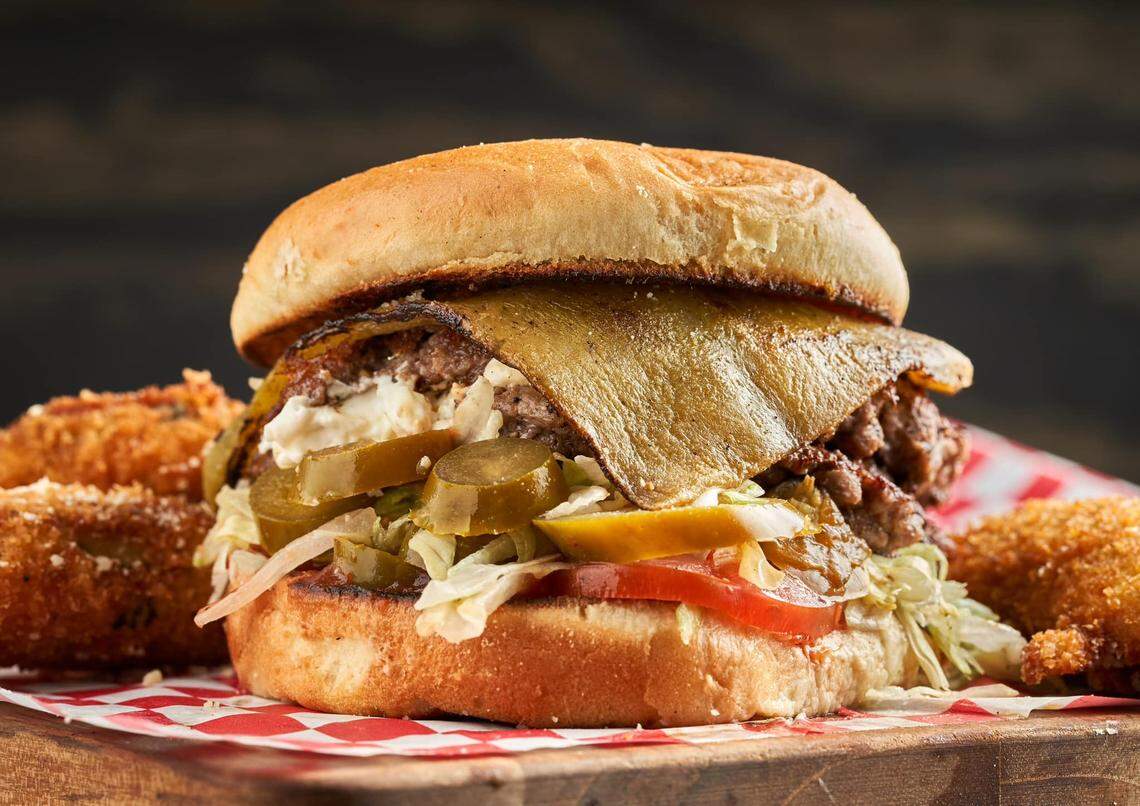 Signature steakburgers are a specialty at the sports-themed restaurant chain.