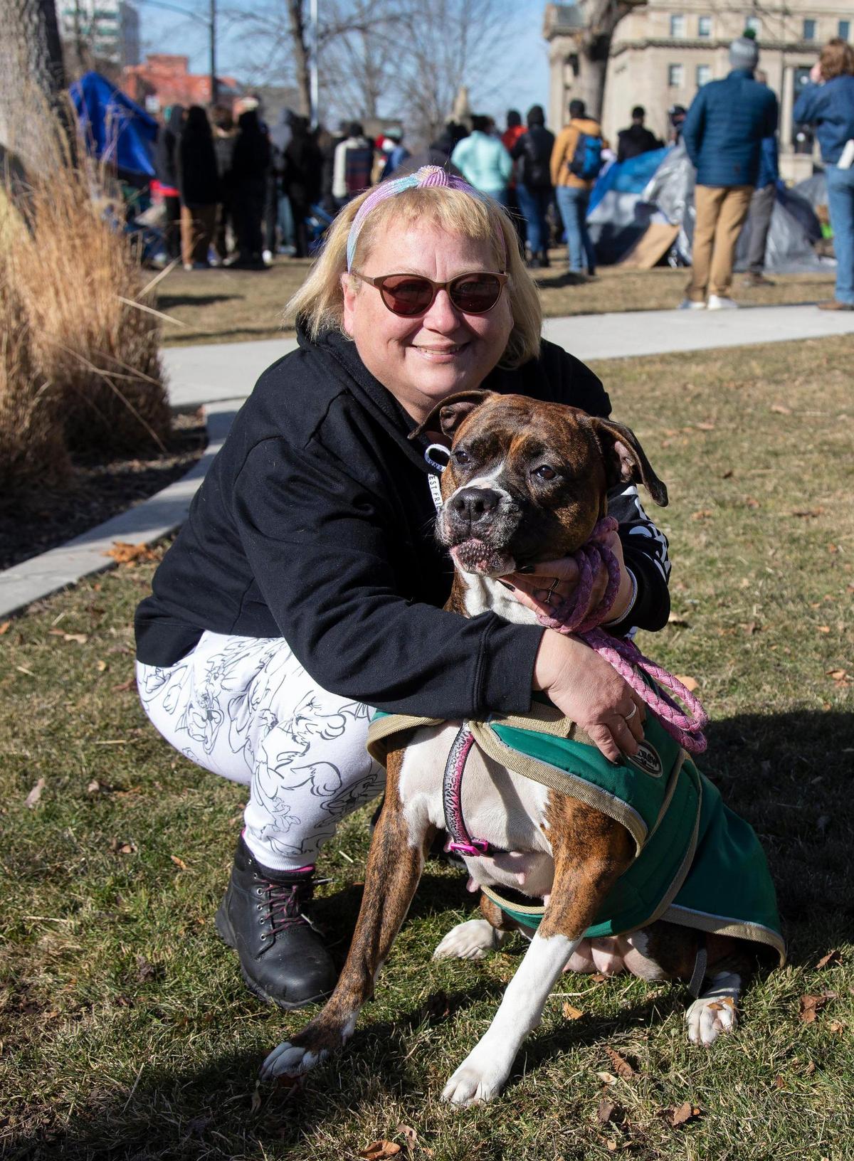 Debbie Collier, her partner Ryan Kempter (not pictured) and their dog live in a car. The three have been part of a demonstration by homeless people and volunteers from Boise Mutual Aid for the past weeks held on the lawn of the former Ada County Courthouse on West Jefferson Street near the State House in downtown Boise.