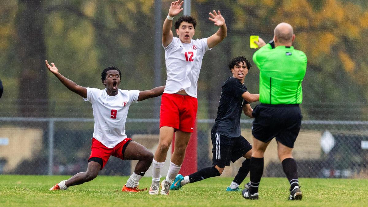 Boise forward Confiance Ishimwe (9) reacts to his second yellow card after being called for a foul in the final minute of regulation in the 6A boys soccer District Three championship game, Wednesday, Oct. 16, 2024.