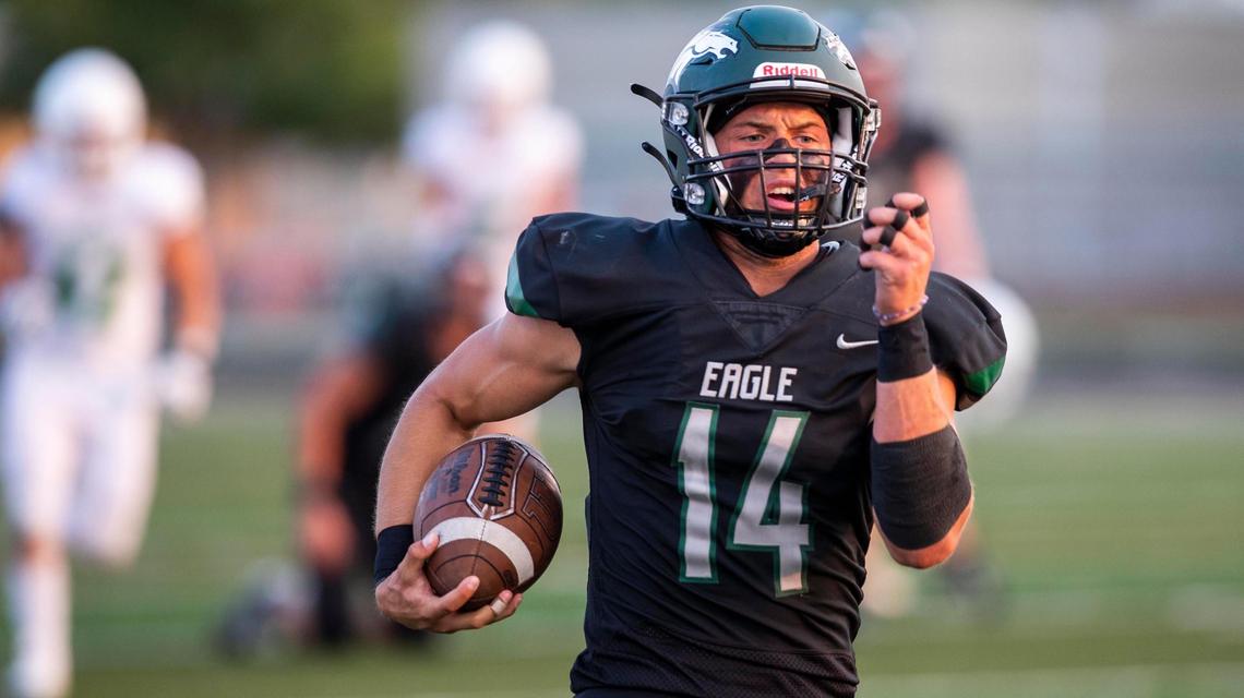 Eagle quarterback Ben Ford breaks free for a 65-yard touchdown run against Mountain View on Sept. 11.
