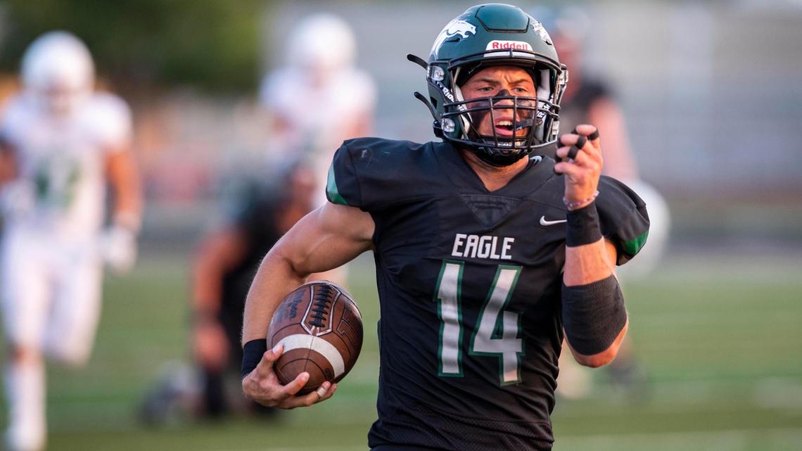 Eagle quarterback Ben Ford runs 65 yards to score his second touchdown against Mountain View on Friday at Thunder Stadium in Eagle.