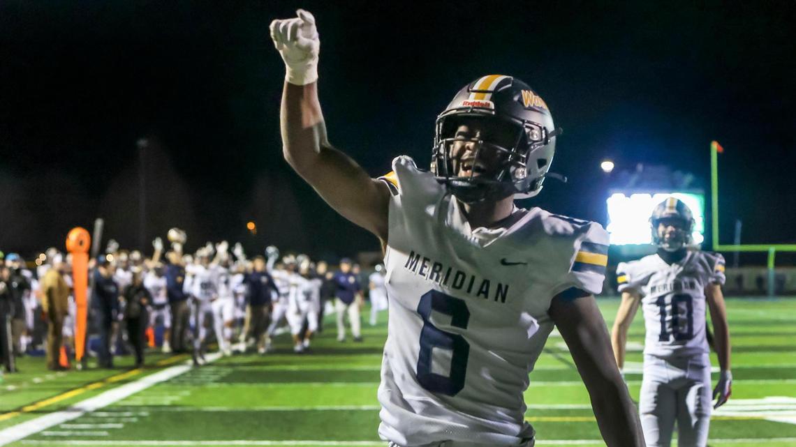 Meridian wide receiver Davis Thacker celebrates his second-quarter touchdown catch Friday at Mountain View. The Warriors scored 35 unanswered points to rout the Mavericks 35-6 in the 5A state quarterfinals.