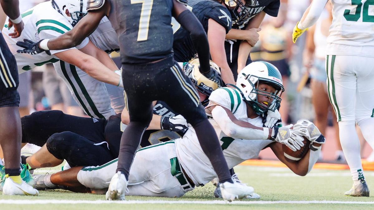 Borah senior running back Jevon Nelson scores a touchdown against Capital in the second half Friday at Dona Larsen Park.