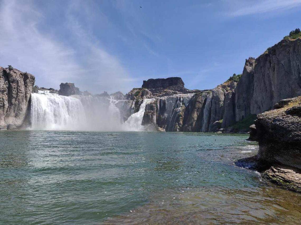 Water crashes over Shoshone Falls in southern Idaho on Saturday, August 3, 2019. Kayaking up the Snake River offers a different view of the 212-foot waterfall.