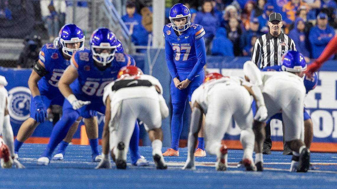 Boise State punter Oscar Doyle lines up for a punt against UNLV last weekend. He completed a pass on a fake punt during the game, one week after he threw a touchdown pass on a botched field-goal attempt.