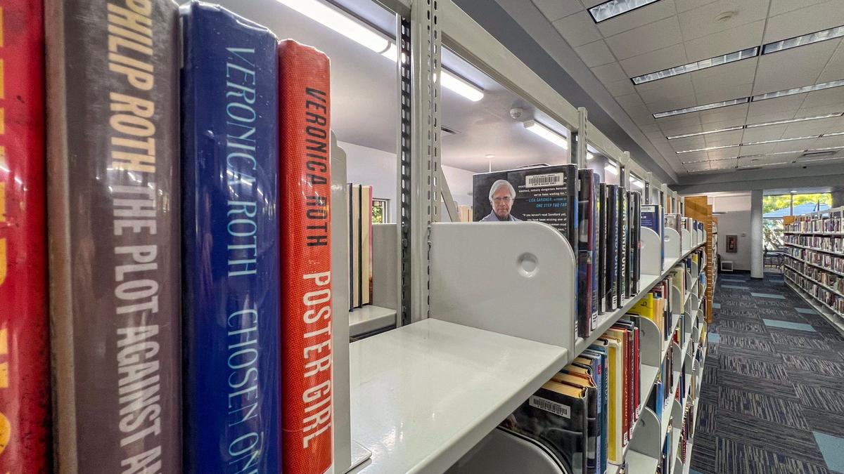 Shelves of the Eagle Public Library after its board voted to relocate 23 books, including three that were moved behind the circulation desk.