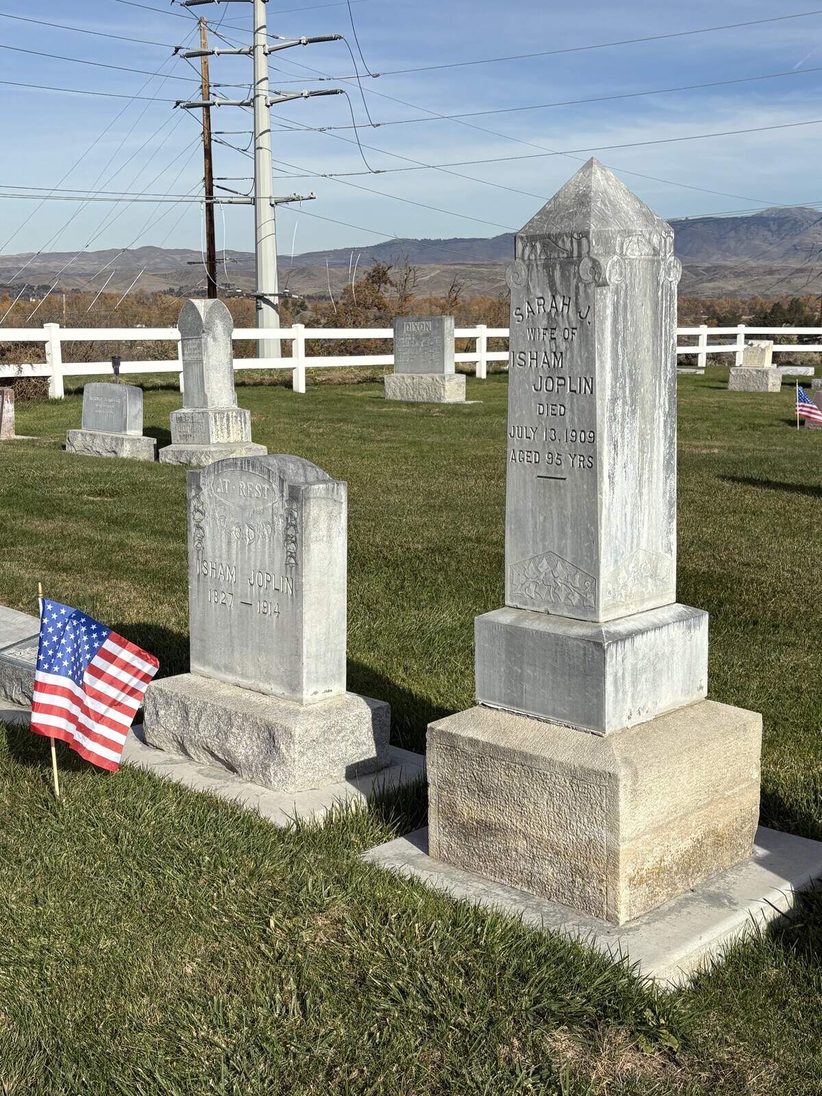 The gravestones of Isham and Sarah J. Joplin.