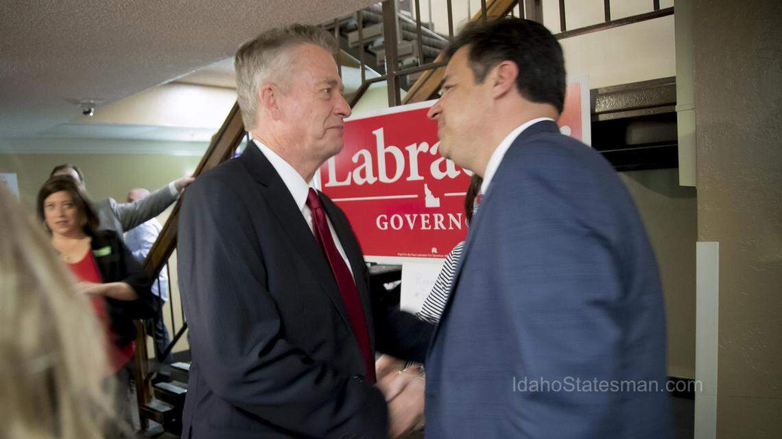 Idaho Republican gubernatorial candidate Raul Labrador, right, concedes the race to Lt. Gov. Brad Little after a long wait for results at the GOP primary election night party May 15, 2018, at the Riverside Hotel in Boise.