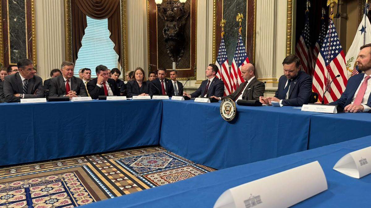 Idaho Attorney General Raul Labrador, left, at a news conference dealing with the White House Fraud Task Force.
