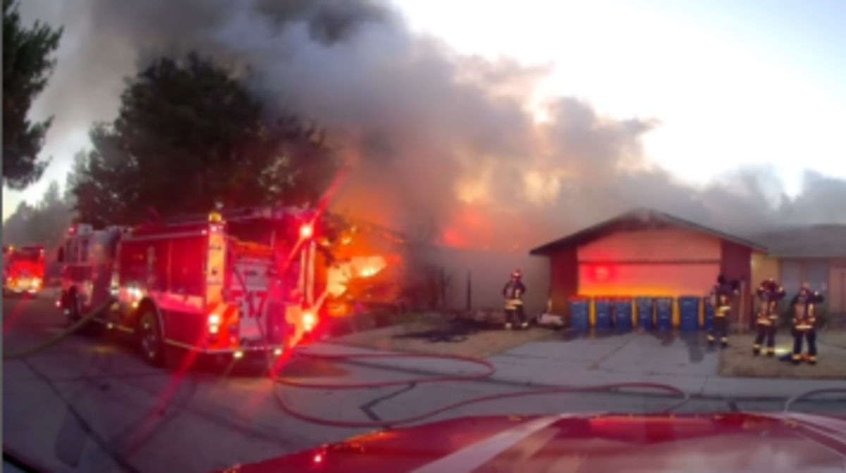 Boise Fire Department crews respond to a blaze on S. Cochees Way that burned two houses early Friday morning. The cause was improperly disposed fireworks, the department said.