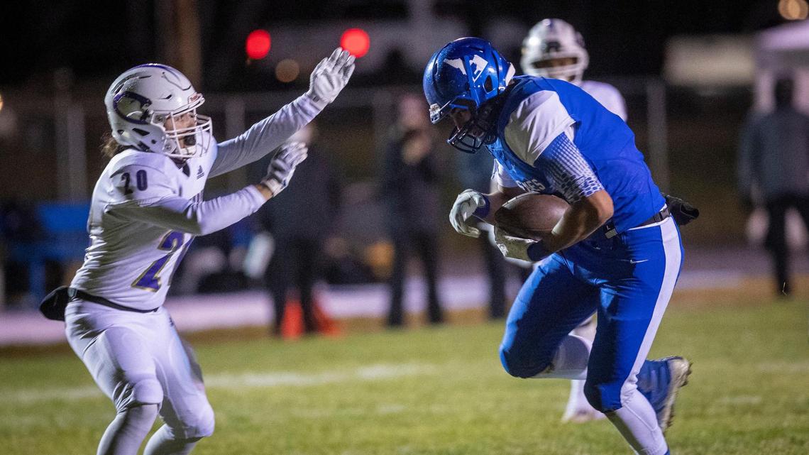 Emmett’s Axel Sanchez hauls in an interception behind the line of scrimmage last week against Century. To knock off No. 1 Skyline, the Huskies will need to keep racking up turnovers in bunches.