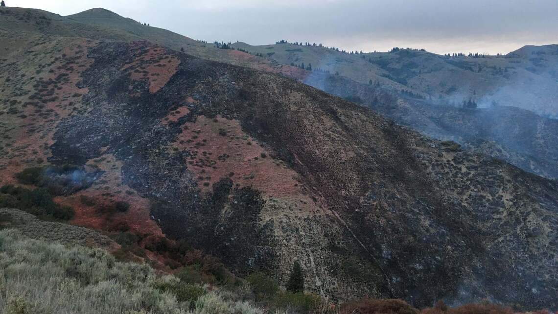 Wildfire outside Boise contained, but others affect air quality. More storms on way?