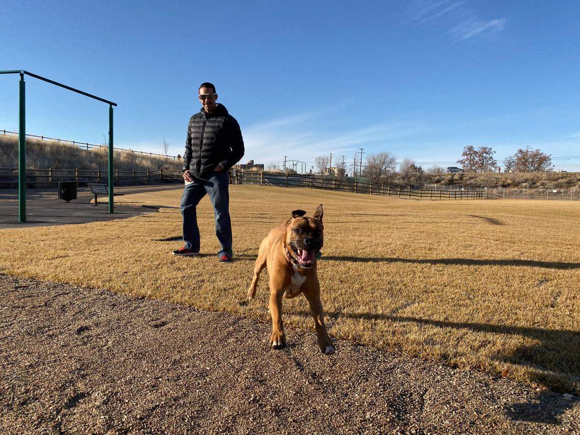 Miguel Sandoval and his boxer, Huckleberry, were the first Boiseans to try out the new dog park at Boise’s Military Reserve on Tuesday, Dec. 10, 2019. 