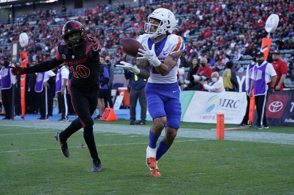 Boise State receiver Khalil Shakir scores on a 13-yard pass from quarterback Hank Bachmeier in the second quarter of Friday’s game against San Diego State.