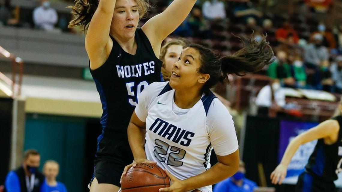 Mountain View’s Naya Ojukwu works against the defense of Timberline’s Sophia Glancey in their opening game of the 5A Idaho State girls basketball tournament Thursday, Feb. 18, 2021 at the Ford Idaho Center in Nampa.
