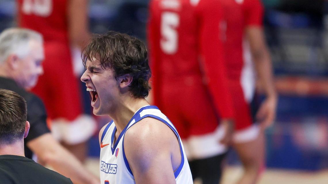 Boise State forward Tyson Degenhart celebrates after forcing a Fresno State turnover at midcourt late in the second half of the Broncos’ 65-55 win over the Bulldogs.