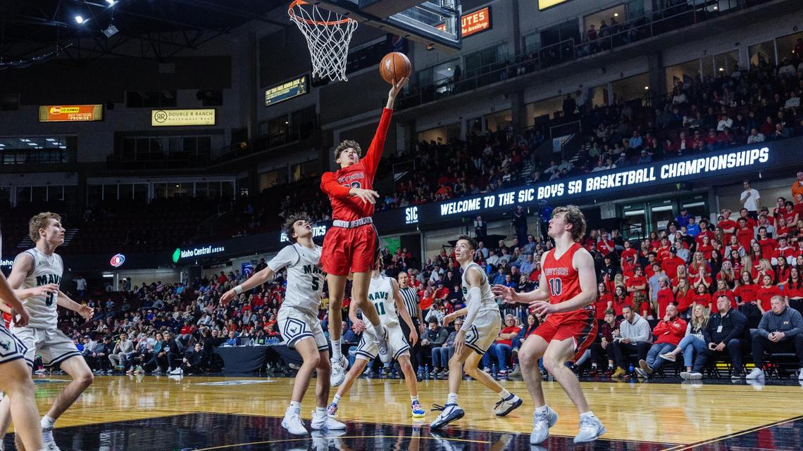 Owyhee sophomore Jayce Allen finds his way to the basket for a layup during during the 5A District Three boys basketball tournament championship game Thursday at Idaho Central Arena. The Storm beat Mountain View 58-51 to repeat as district champs.