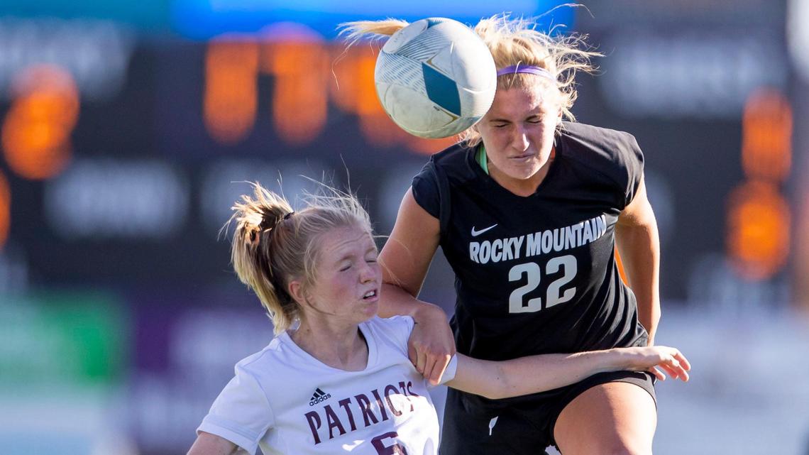 Rocky Mountain midfielder Myalia Carver beats Centennial’s Abby Munn to a header Thursday in the first round of the 5A girls soccer state tournament at Rocky Mountain High School in Meridian. Rocky Mountain won 3-1.