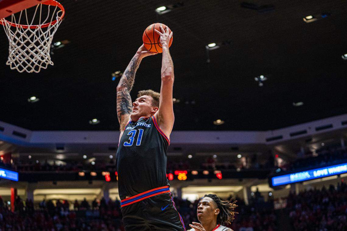 Boise State’s Cam Martin goes in for a dunk Wednesday in the Broncos’ 86-78 win at New Mexico.