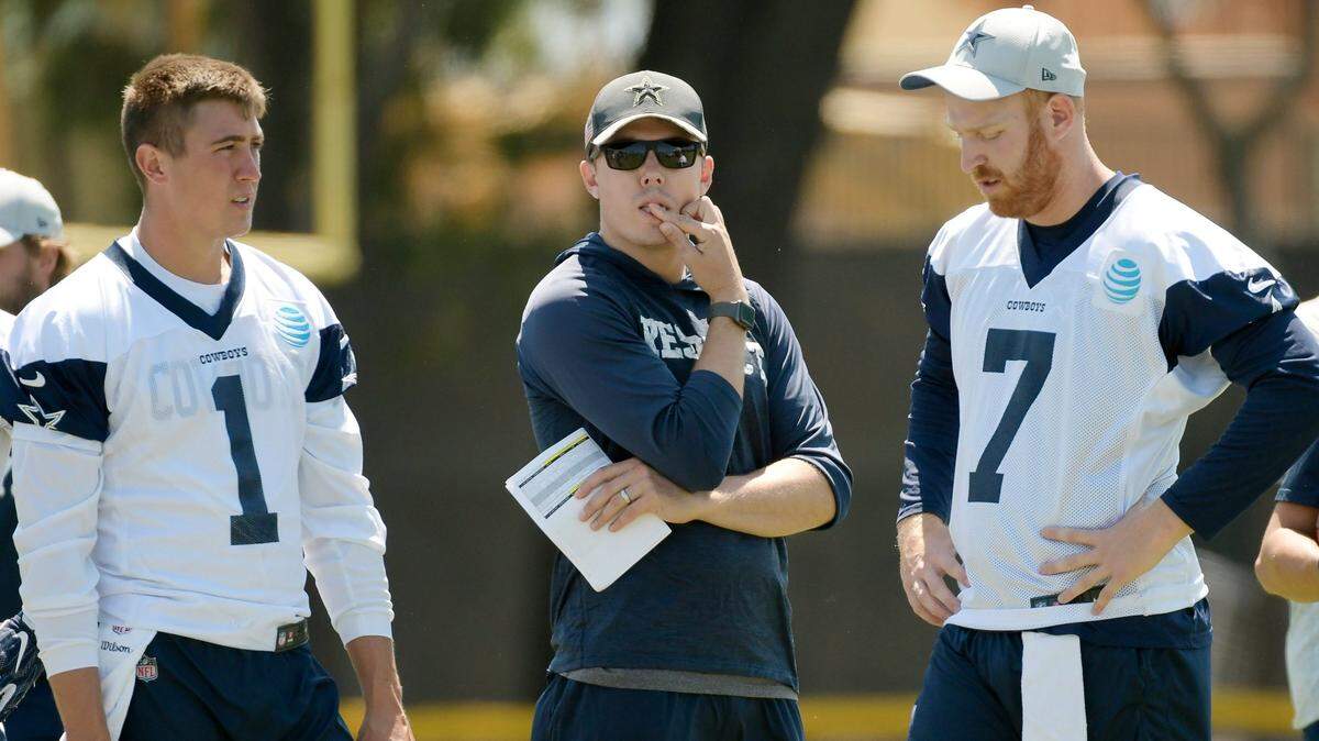 The Dallas Cowboys may be hiring Prosser High graduate Kellen Moore, shown here in 2018 working as the quarterback coach, as their new offensive coordinator.