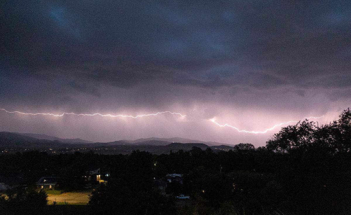 A thunderstorm with heavy lightning moved through Boise, seen here from Federal Way looking north, on Thursday night, Sept. 15, 2022. 