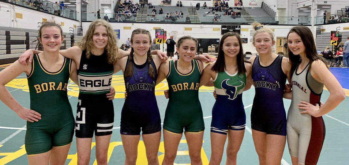 Seven girls qualified for the 5A District Three tournament last week, including, from left to right, Borah’s Michael Bernier, Eagle’s Liv Wieber, Rocky Mountain’s Alexandra Garvin, Borah’s Kaci Bice, Mountain View’s Sophie Sarver, Rocky Mountain’s Mia Furman and Centennial’s Kaydance Wiggins. Wieber advanced to the 5A state tournament at 113 pounds.