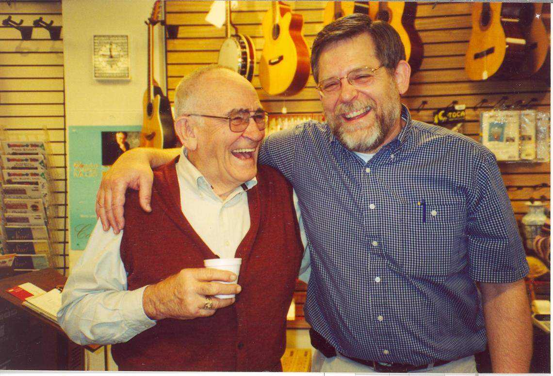 PJ Winther, left, and son Greg Winther at Winther Music in 2001.