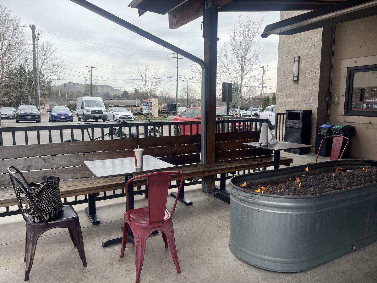 Fire pit patio seating at Tin Roof in Boise