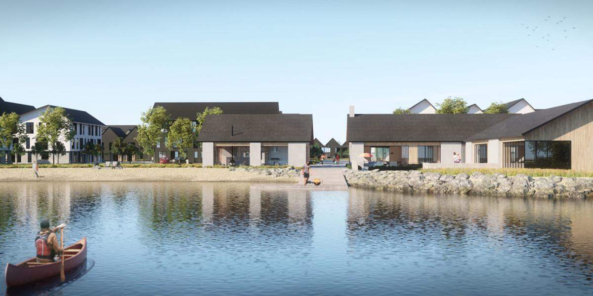 This artist’s rendering shows a pond with a beach and a boat ramp adjoining the planned The Clara apartments and townhouses in Eagle.