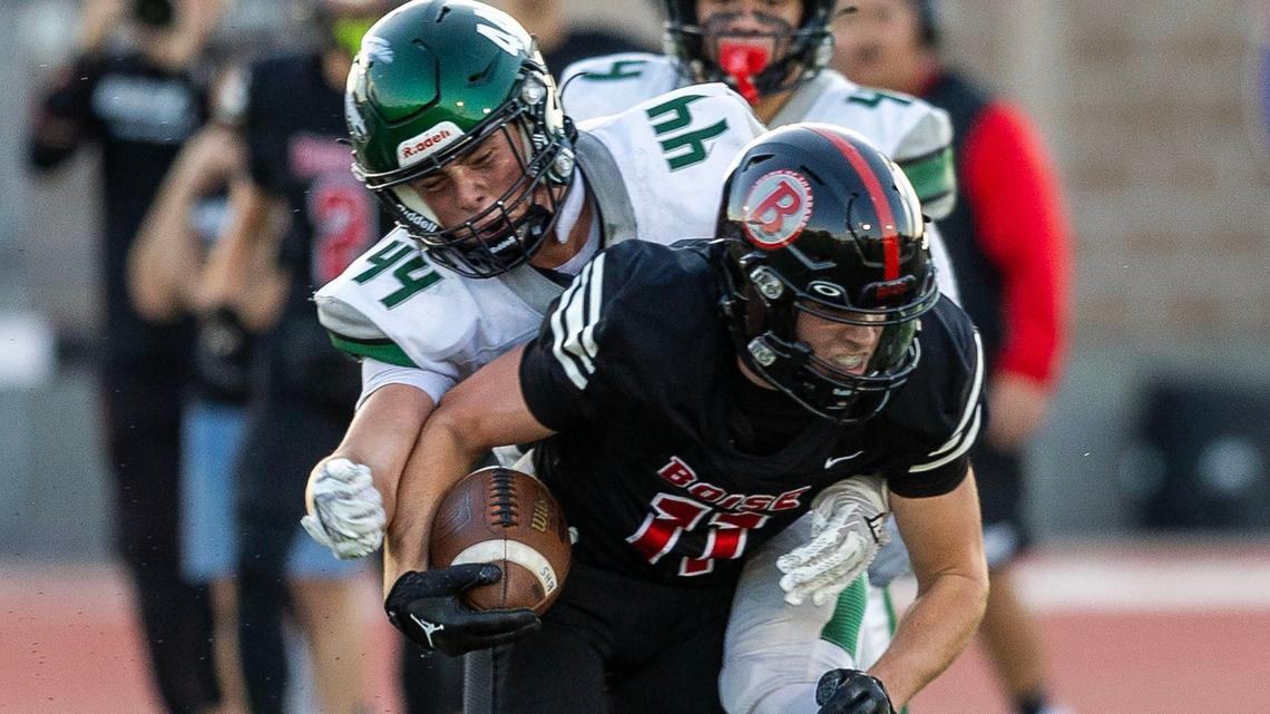 Eagle linebacker Jaxson LeBeau brings down Boise’s Will Gebert in the first half of a Sept. 19 game last season. 