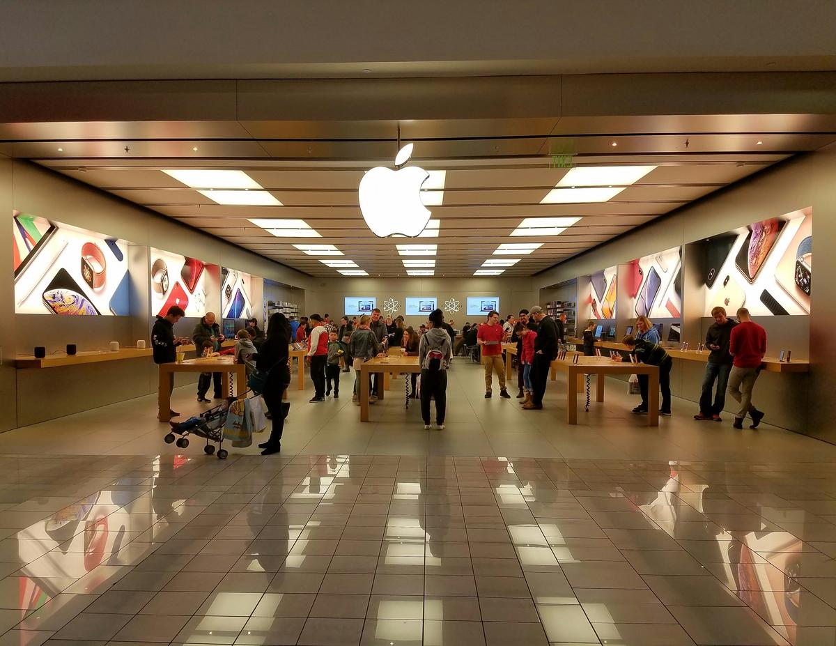 Shoppers throng to the Apple Store at the Boise Towne Square to try out the latest electronics.
