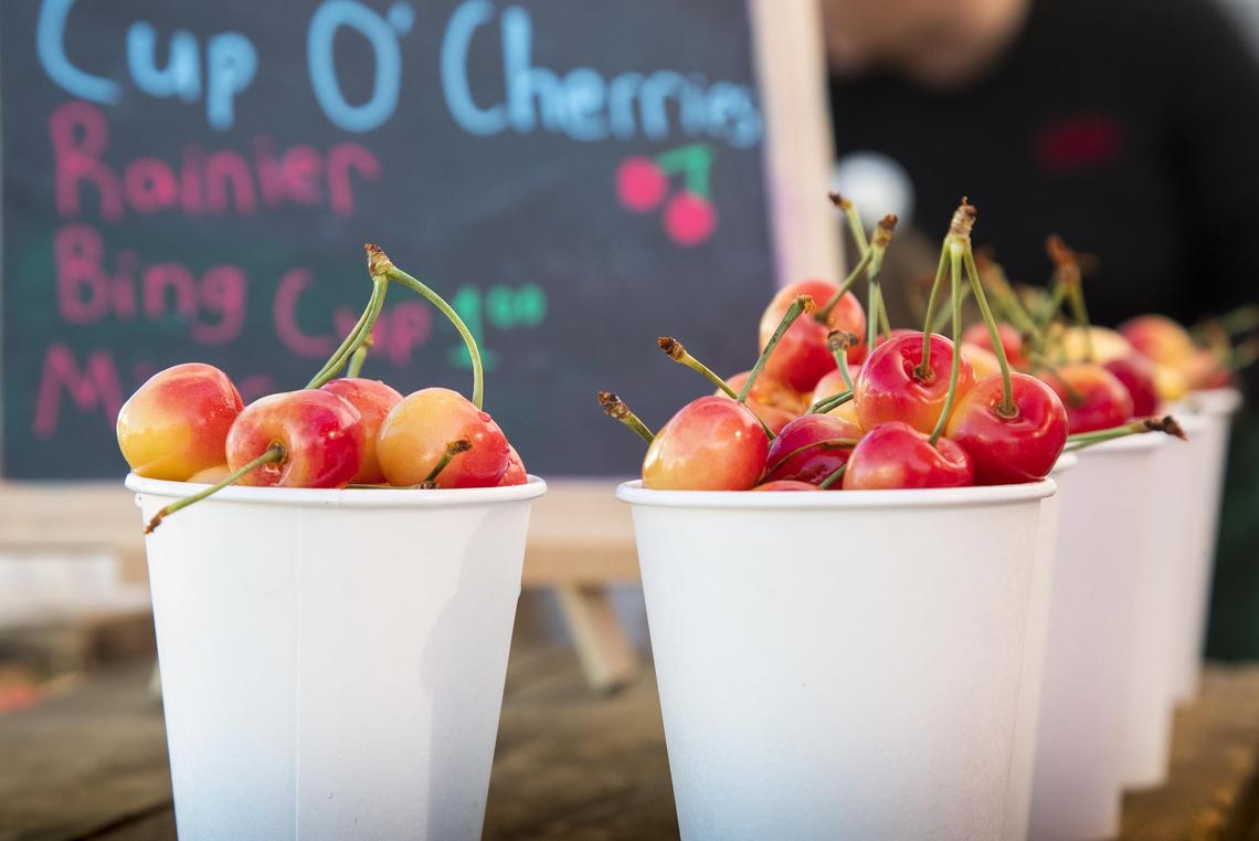 Cups full of Rainier cherries await patrons of Kelley’s Canyon Orchard at the Boise Farmers Market.
