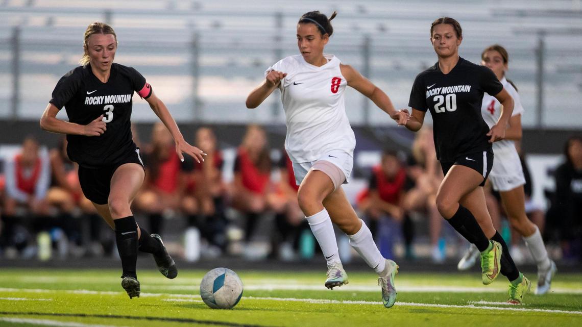 Boise forward Kunie Hirai, center, is one of nine returning starters for the Boise girls soccer team, the reigning 5A district and state champs.
